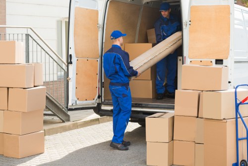 House movers working in Clapham near a residential street
