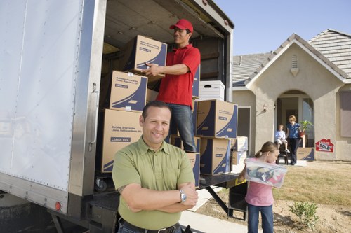 Packing and loading belongings into a removals van