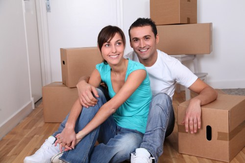 Man with van loading furniture for a Clapham home move