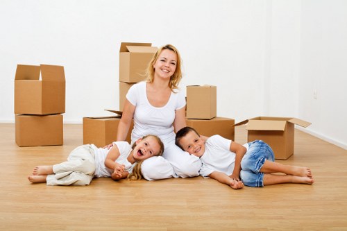 Van moving boxes and household items in South London