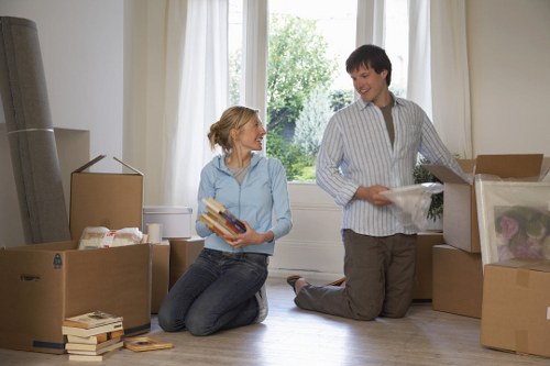 Packed office equipment and furniture ready for transport