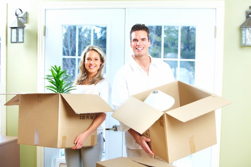Local moving team organizing items before transport